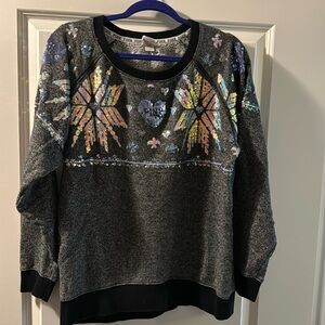 A very well kept Victoria’s Secret pink sweater